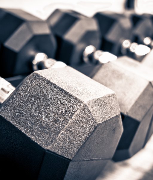 Rack of hand free weight dumbbells at a healthclub gym