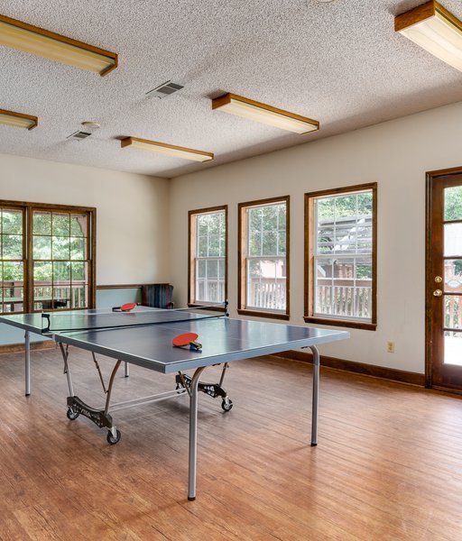 indoor game room with ping pong table